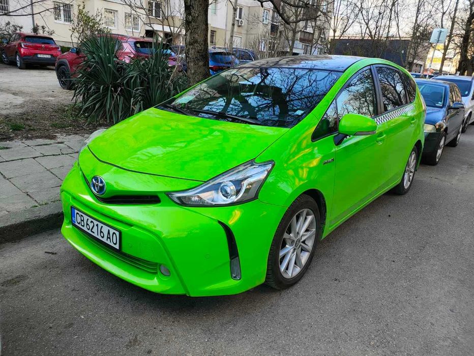 Такси под Аренда към Taxi Me,Toyota Prius+,7 Местен,Хибрид плюс Газ-68лв/35 евро на ден
