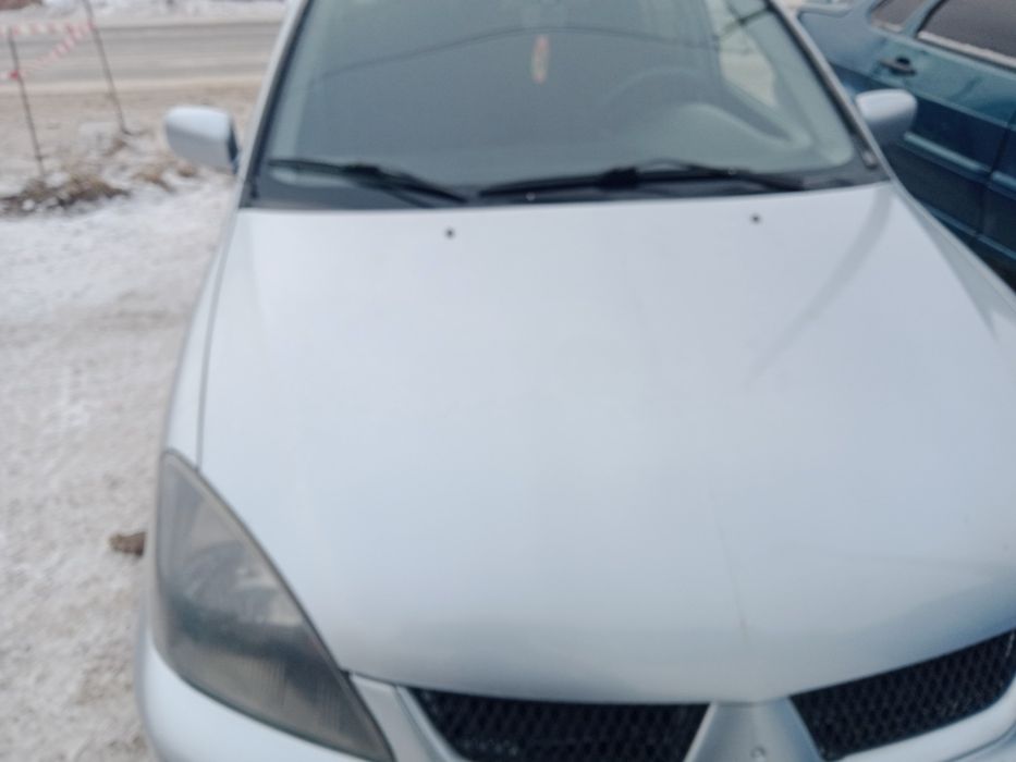 Мицубиси Лансер 9