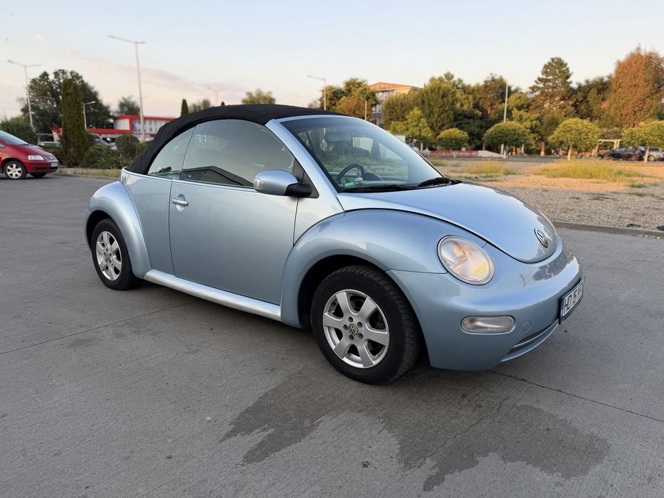 Volkswagen New Beetle “ broscuță” •An 2003 • 1.6 benzina•
