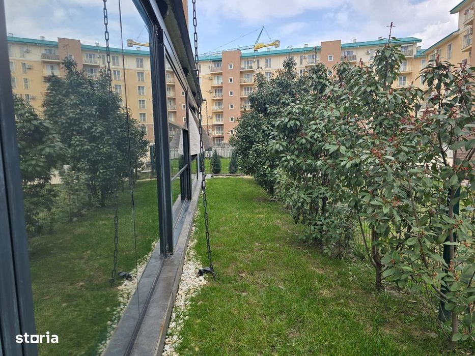 COSMOPOLIS - Apartament cu 2 camere si gradina, mobilat si utilat.
