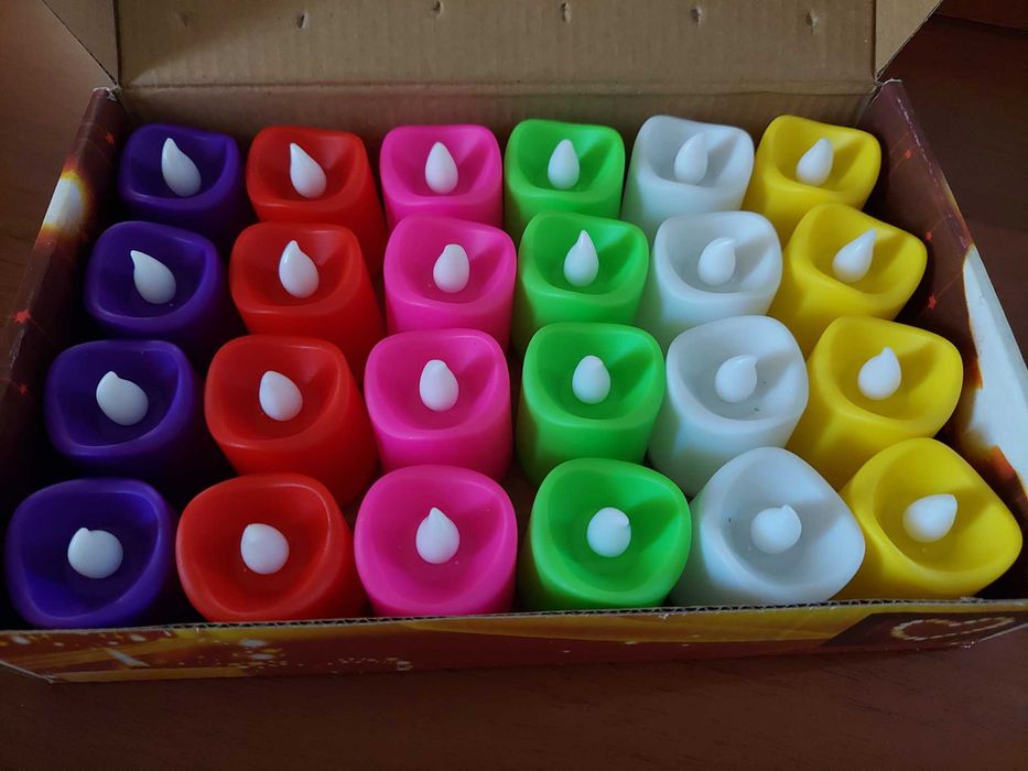 Новые электронные свечи со светомузыкой разноцветные