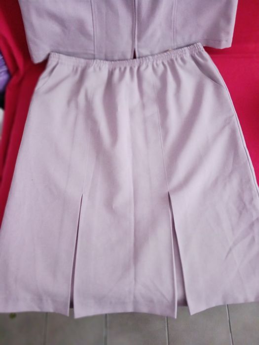 Дамски костюм бледо лилав цвят.Голям размер.