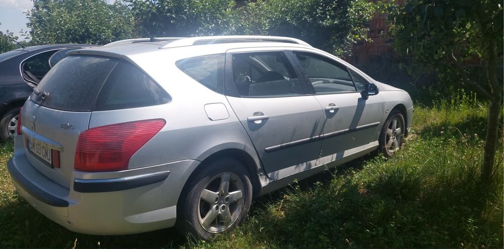 Vând peugeot 407 an 2005 cu panoramic si pililot automat!