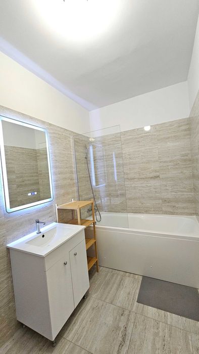 Apartment 2 camere de inchiriat! 10 min metrou. Parcare acoperita. 71mp. 2 balcoane. Bloc nou. Etaj 1