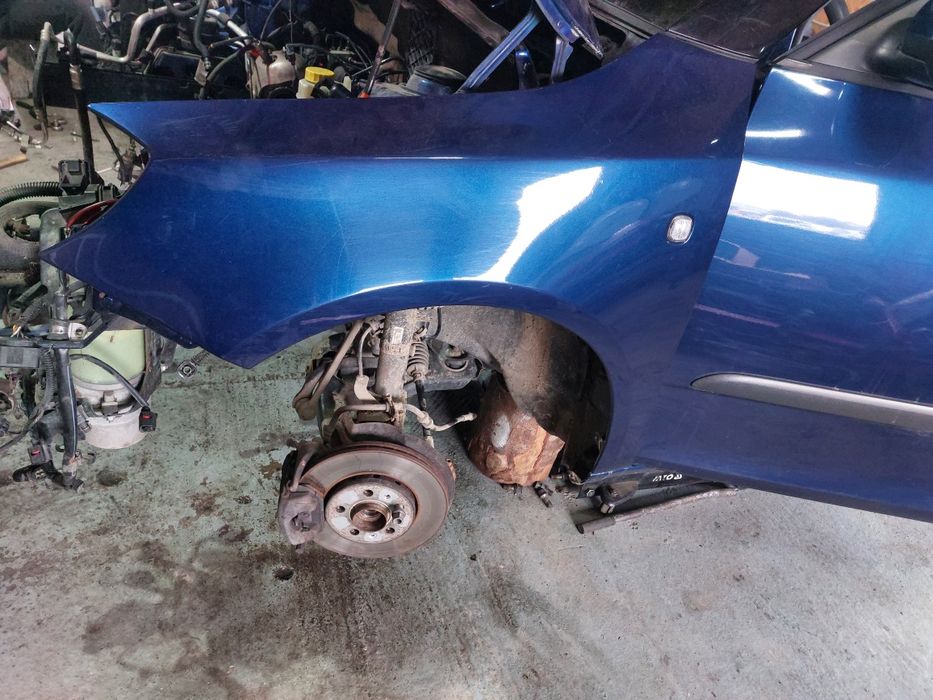 Aripa stanga fata  Skoda Fabia 2 5J an 2010 culoare albastru