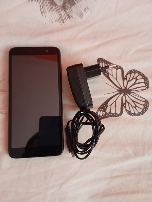 Телефон Алкател нов.