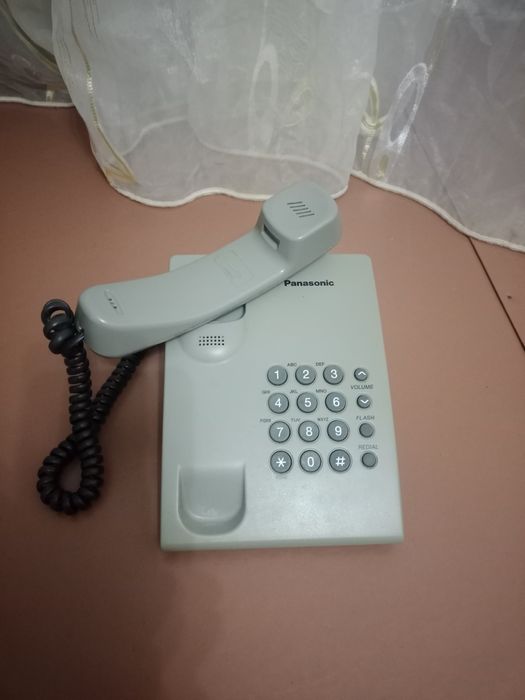 Фотоаппарат и домашный телефон