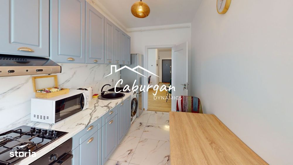 Apartament cu 2 camere, 50mp utili+balcon, bucatarie inchisa,parcare.