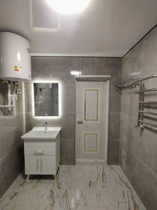 Янги домдан евроремонтли 2 хонали квартира 1 каватдан сотилади Мелодия