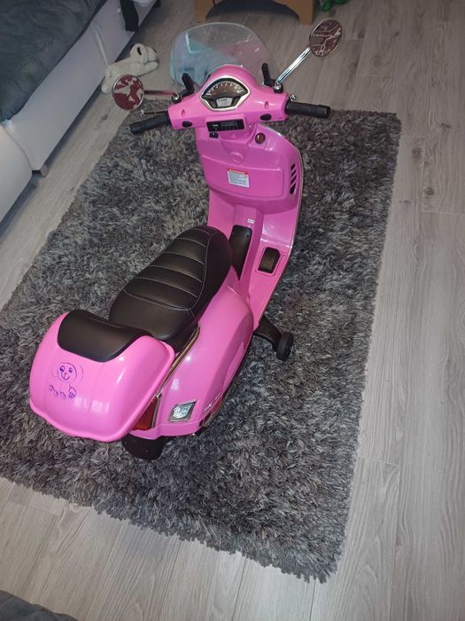 .Motoreta vespa .