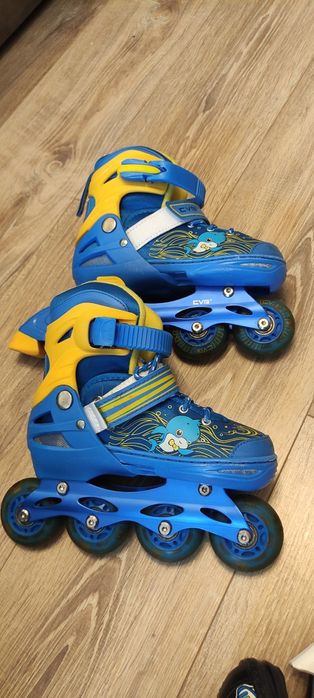 Роликовые коньки