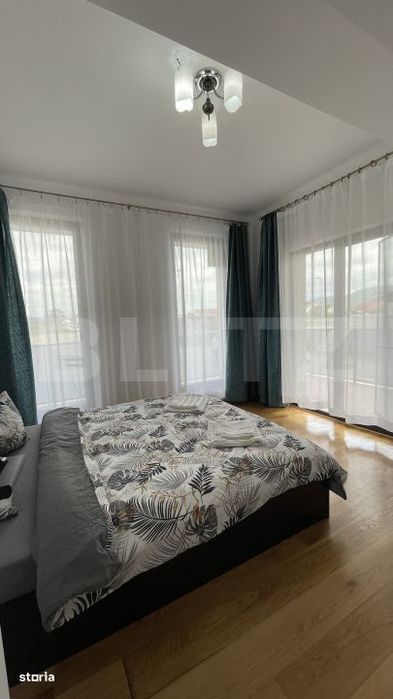 Apartament bloc nou, 72 mp, 2 dormitoare si living, parter, zona Nord