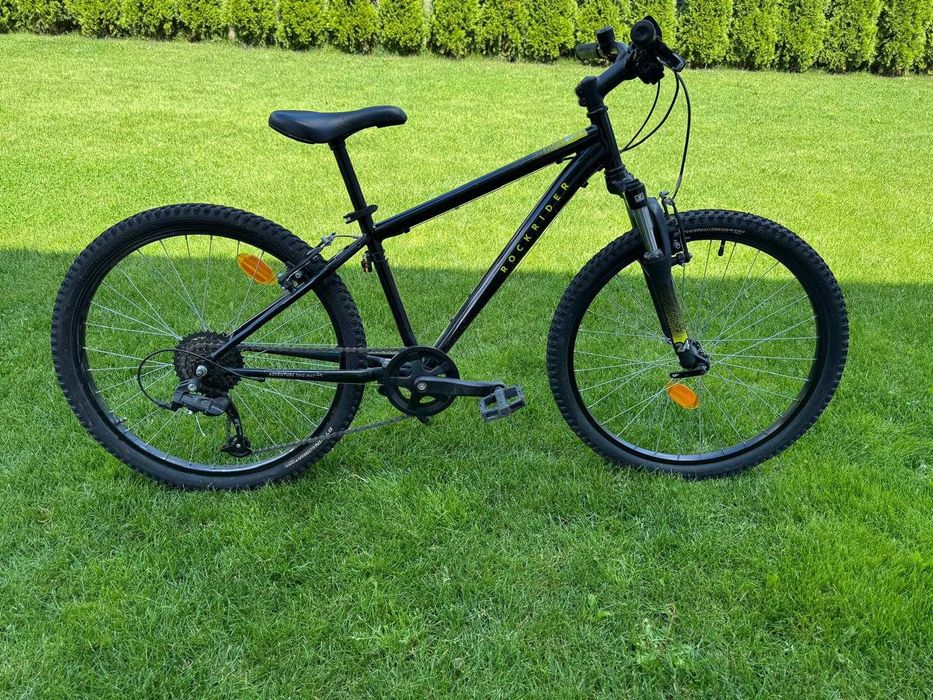 Bicicletă copii Rockrider ST 100 (24 inch, 9-12 ani), stare excelentă + cric inclus