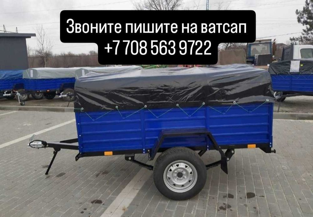 автомобильный прицеп с тентом