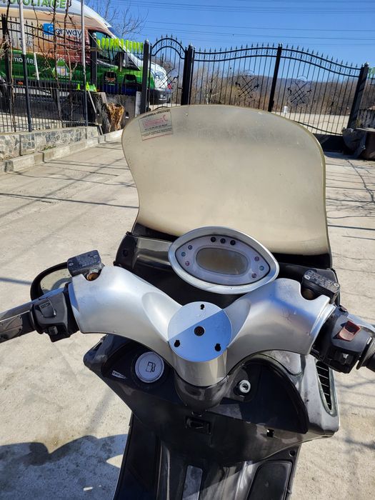 Vand sau schimb scuter kymco grand dink 250 cm