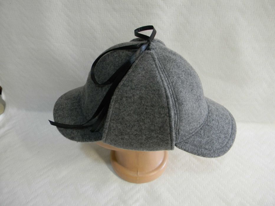 Sepci, berete, palarii. Producator.