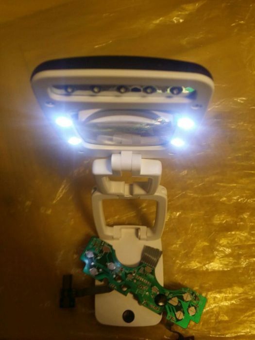 Светильник-лупа,новая,складная. Также лупы с ручкой.Смотрите все фото.