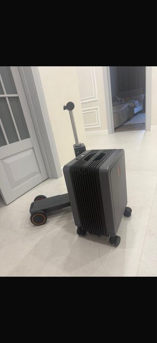 Чемодан самокат электронный