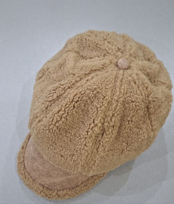 Дамска пухена шапка