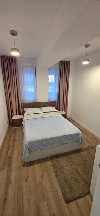 Inchiriez apartament cu 3 camere, complet utilat, bloc nou, loc de parcare