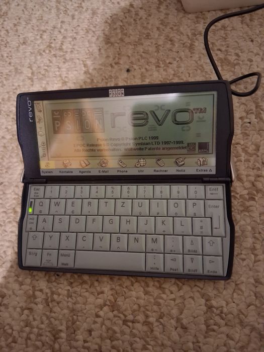 revolution computer calculator-"Psion" anului 99,functional ,colectie