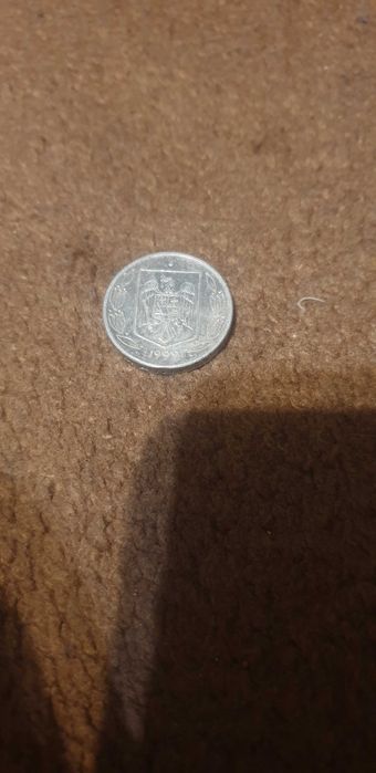 Vând moneda de 500 de lei din 1999