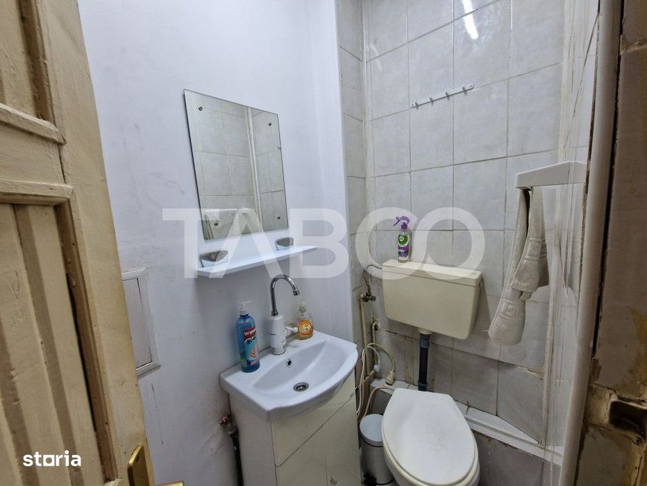 Apartament central 4 camere spatiu comercial garaj si pivnita Sibiu