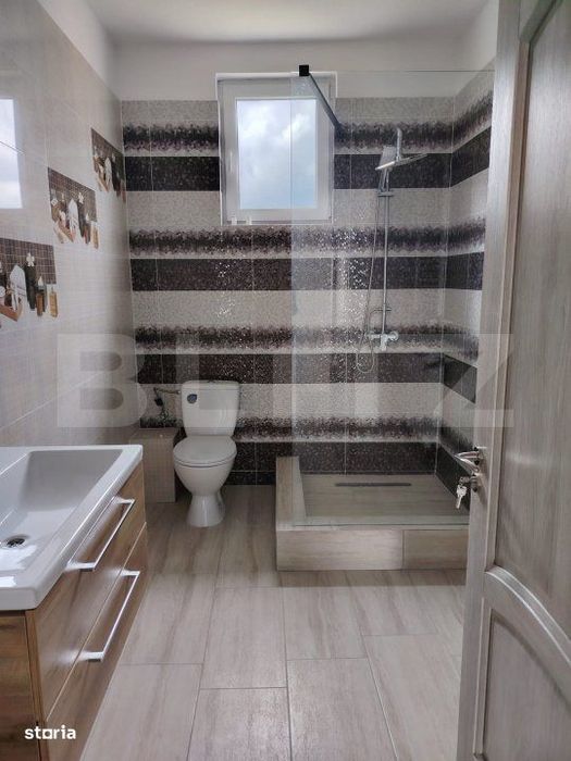 Casa de vanzare, cu 6 camere, 288 mp, zona Voinesti