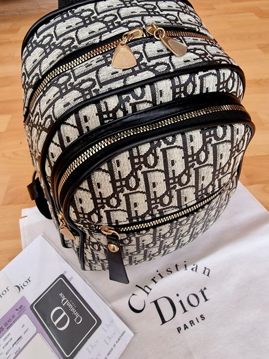Rucsac material textil, super model, feronerie metalica, saculet, etichetă