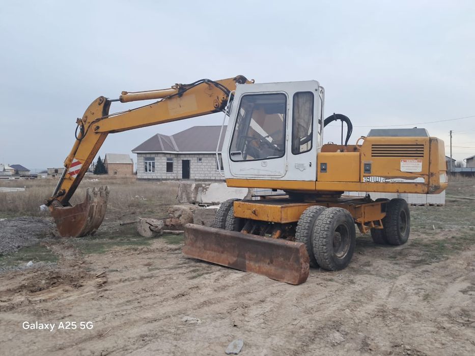 Продается колесный экскаватор