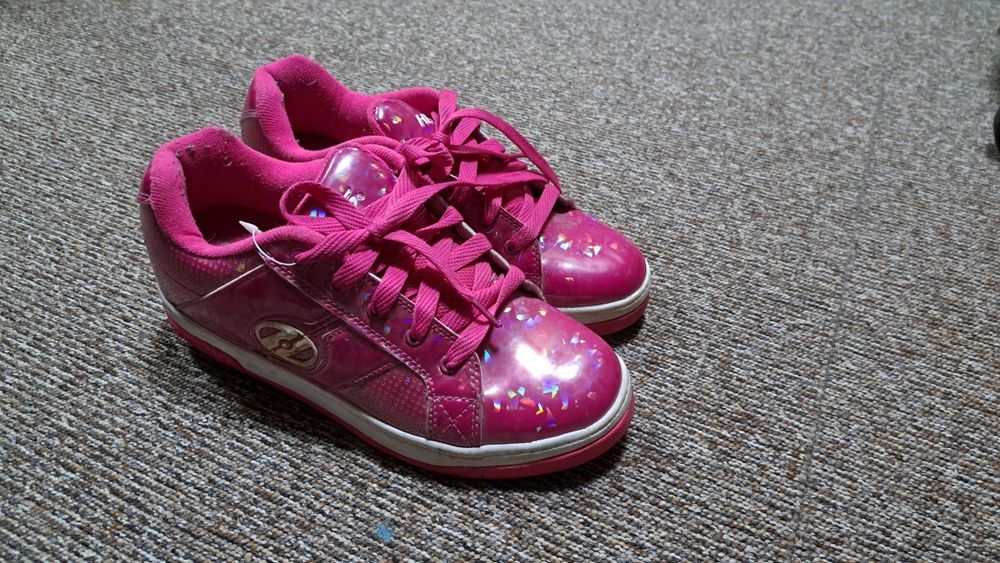 Роликовые кроссовки Heelys