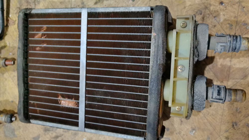 Мазда Кронос радиатор печки