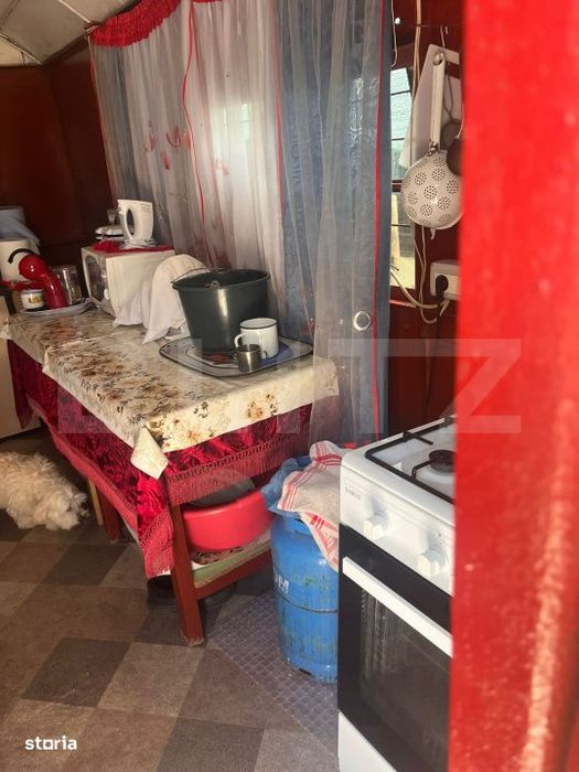 Casa 2 camere, 116 mp, teren 3.548 mp, zona Tataresti