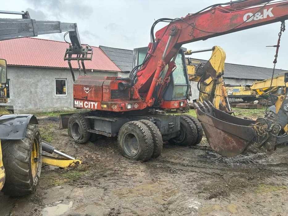 Piese excavator pe roti O&K OK MH CITY
