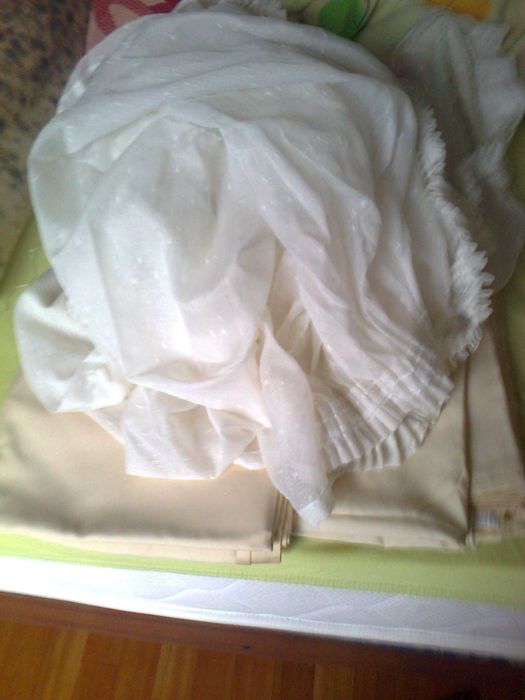 продам тюлевую занавесу и плотные шторы