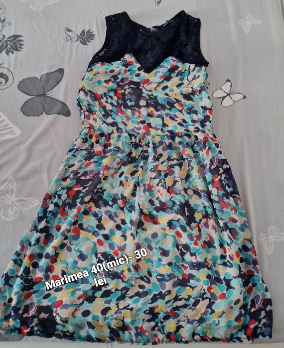 Haine dama, preț negociabil