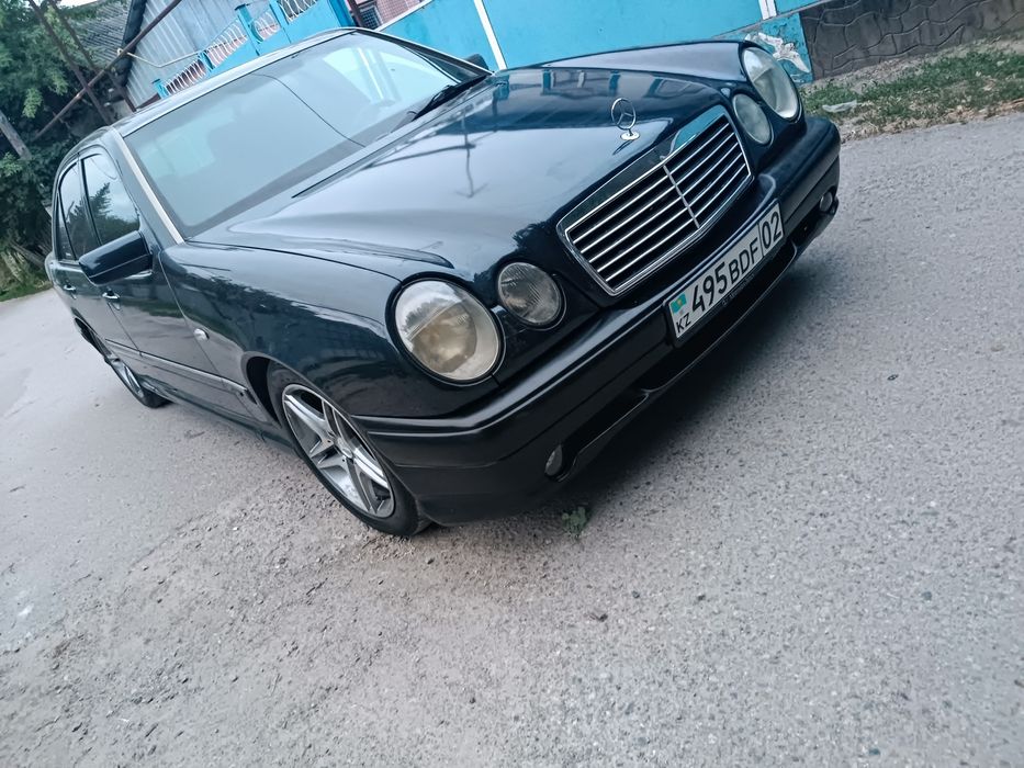 Передний бампер E55 AMG на Mercedes W210