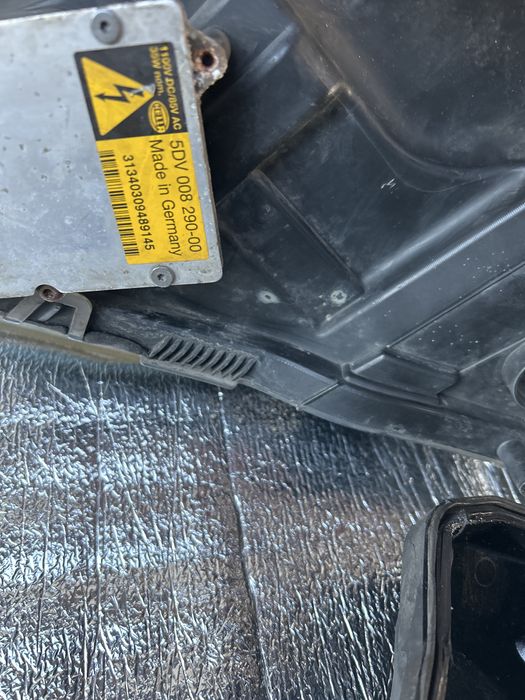 Faruri Xenon Opel Astra H cu mufe incluse .