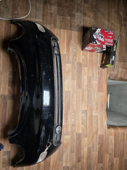 Предна броня VW New Beetle + решетки + 2 халогена (черна)