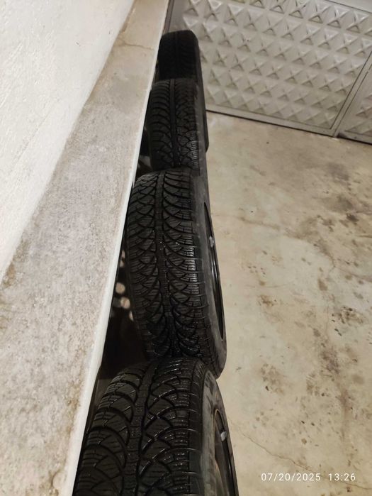 Зимни гуми Fulda 185/65/15 с железни джанти за Opel Corsa D и тасове