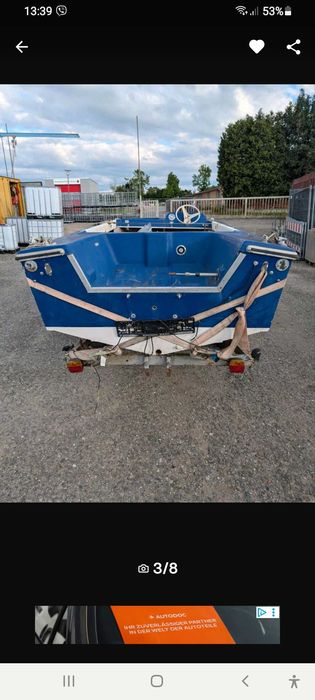 Моторна лодка с мотор и ремарке