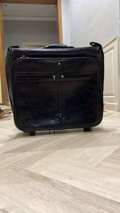 Дорожная кожаная сумка