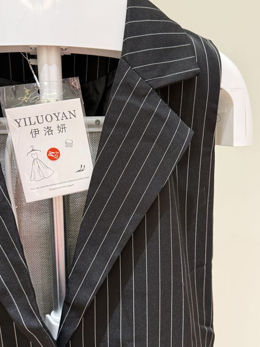 Продаю жилетку длинную женскую