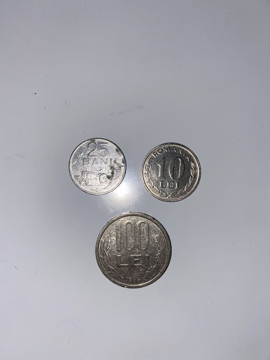 Monede de 100 lei, 10 lei și 25 bani
