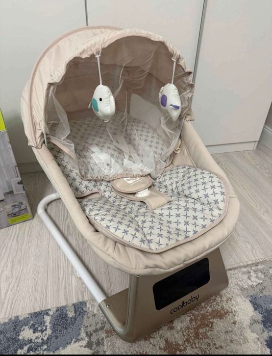 Leagăn electric pentru bebeluși
