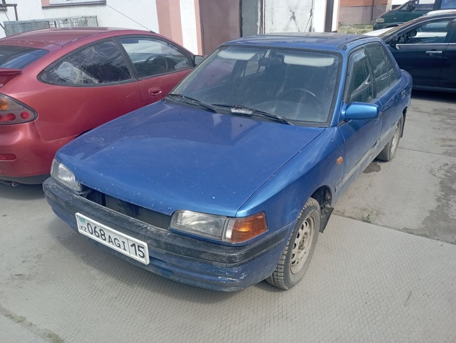 Мазда 230000 тенге