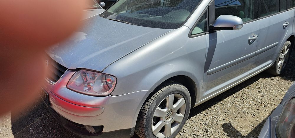 На части VW Touran 2.0