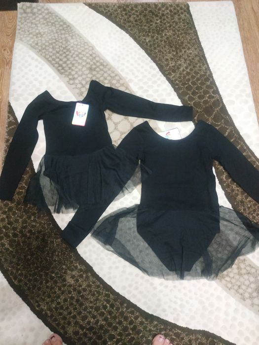 Продам гимнастические купальники на девочек.