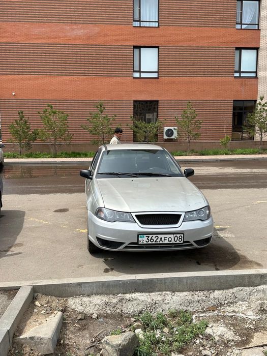 Daewoo Nexia серебристый