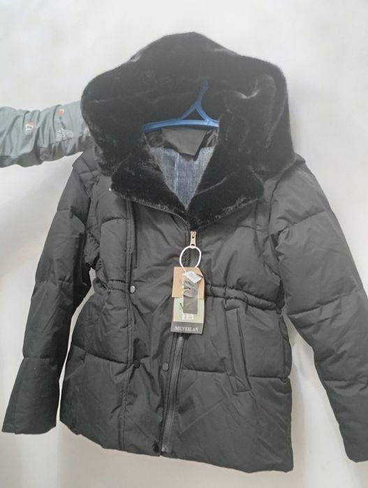 Продам женский куртку новый